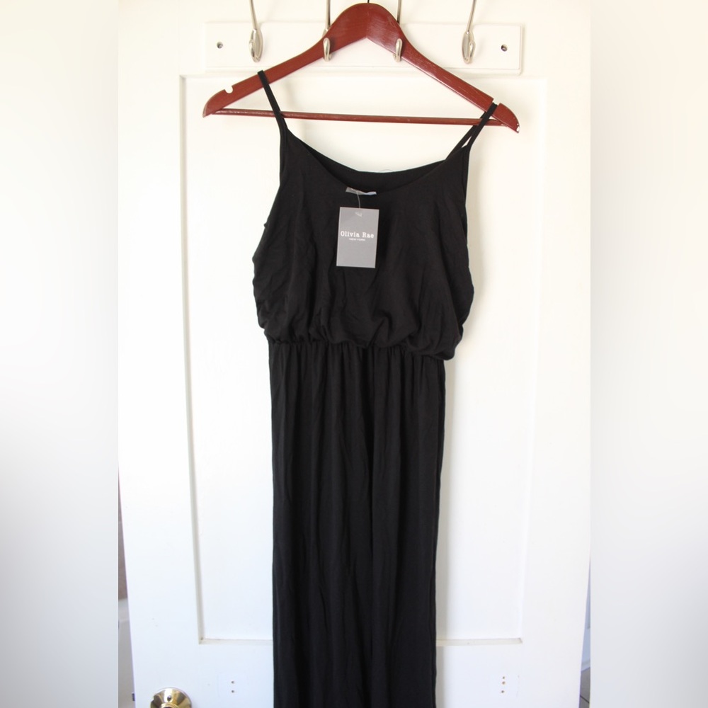 All black Olivia Rae dress. Size xs but fits more like a small-medium